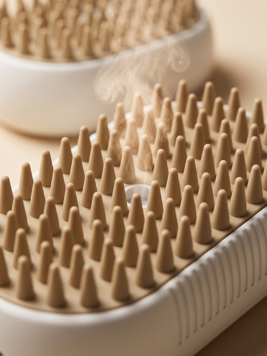 Detalle de las puas de silicona beige y la boquilla de vapor
